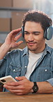 Ecommerce, man and music in small business with phone, distribution job and streaming song on break. Happy, person and logistics in startup with headphones, groove and listen to radio with good vibes