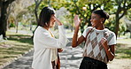 Happy, students and people at college with high five, congratulations and acceptance for scholarship. Excited, women talk and walk outdoor with celebration for university grant, success or milestone.