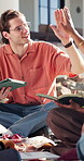 Students, high five and happy man with tablet, university and celebration for academic development. Outdoor, education and friends with achievement, discussion and people with technology at college