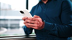 Hands, business and lawyer in office with phone, contact witness and new evidence for court case. Person, attorney and review at law firm with mobile, upcoming trial and report on proceedings verdict