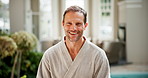 Face, man and wellness at resort with spa experience, hospitality and staycation for stress relief. Happy, mature person and relax in luxury hotel with good mood, vacation or weekend getaway for rest