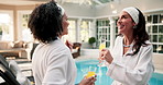 Happy, friends and dance at spa with drinks, bonding together or feel good energy for luxury holiday. Mature women, connection and enjoy music at resort with mimosa, fun vacation or movement to song.