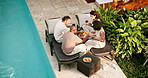 Relax, swimming pool and friends on holiday with food for lunch with drinks, snacks or top view. Vacation, mature people and eating outdoor with wine, charcuterie board and bonding at summer resort