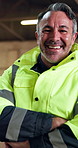 Construction, face and man with clipboard for inspection, material checklist and renovation. Portrait, supervisor and mature carpenter walking in factory for inventory, timber business and stock
