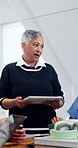 College, lecturer and woman with tablet, advice and planning for assignment with research in class. Education, online and people with tech, explaining and  mature professor with info in university