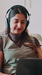 Home, headphones and woman with laptop for remote work, song writer or typing for lyrics composition. Computer, music and happy freelancer on couch with online research, streaming and audio editing