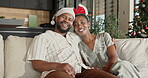 Christmas, face and happy black couple hug on home sofa for bonding, quality time and love. Man, woman or festive season in house with connection, commitment and holiday celebration or tradition
