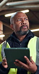 Construction worker, thinking and man with tablet on building site, inspection and research on web. Low angle, reflection and mature black person with tech, online or plan for property development