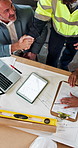 Architect, people and shaking hands for development agreement, project approval or blueprint above. Team, engineering and handshake at site, building design and collaboration with tablet screen