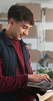 Smile, man and logistics at startup with laptop, stock availability and confirm order for delivery. Happy, person and typing in warehouse with tech, supply chain and supplier information for shipping