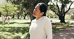 Fitness, woman and stretching neck at park for wellness, health benefits or muscle tension relief. Mature person, warm up and prepare outdoor to start exercise, blood circulation or active lifestyle