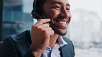 Telemarketing, man and happy in office with discussion, advice or close deal for insurance premium. Person, smile and talk in call center with headset, lead generation or sales agent for policy cover