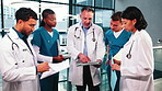 Medical team, tablet and planning in clinic with doctors, case review or diagnosis collaboration. Tech, people or healthcare discussion with nurses for history overview, checklist document or meeting