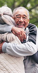 Senior, fitness and happy couple with hug in nature for outdoor workout preparation together. Active, elderly man and woman with smile, love or high five for embrace, health and wellness in park
