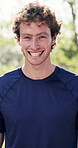 Face, laugh and man in park for fitness, exercise and break for wellness and active outdoor. Happy, portrait and person with pride for workout, healthy lifestyle and training for fresh air in nature