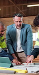 People, meeting and blueprint in workshop for carpentry, research and structure for manufacturing. Carpenter, team and tablet in factory with floor plan, illustration and briefing for joinery project