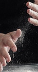 Person, hands and clapping with flour on table for culinary art, hospitality or meal prep for pizza. Pastry chef, food or getting ready with texture or seasoning for catering, recipe or cuisine