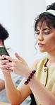 Student, woman and reading in class with phone, check faculty website or online research for project. Person, typing and browsing in university with tech, learning and digital quiz for education.