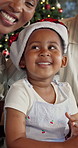 Smile, parents and child on Christmas with talk, quality time or storytelling for holiday tradition. Support, black family and happy girl with bonding for xmas, festive season or conversation in home