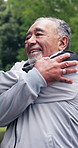 Senior, man and stretching in nature for outdoor workout preparation, exercise or training. Active, elderly or male person getting ready with arm warm up for fitness, health or wellness in park