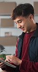 Man, review and logistics at startup with tablet, stock availability or confirm order for delivery. Smile, person and laugh in office with tech, supply chain and procurement for commercial shipping