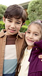 Face, siblings and children hug in neighborhood for bonding, connection and relationship outdoor. Portrait, happy and boy with girl embrace for love, affection and trust in front yard for new home