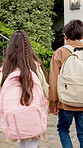 Backpack, kids and walk home with holding hands, after school routine or safe return with sibling. Stairs, children or security in front yard with family support, independence or back from elementary