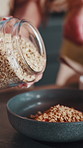 Breakfast, diet or hands in house with oats, health eating or benefit in cholesterol control. Whole grain, couple or woman with nutrition, digestion support or cardiovascular wellness in morning meal