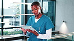 Nurse, woman and tablet in hospital with scroll for medical advice, research and telehealth app. Black person, technology and internet connection at clinic with results, pride and happy by window