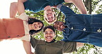 Park, face and friends in circle with hug, social connection and outdoor community with smile. Low angle, happy people or huddle together for friendship bonding, diverse belonging or embrace in unity