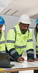 Construction worker, teamwork and meeting with blueprint in building, ideas or talk with electrician. Engineer, collaboration and people with paperwork, flare and planning for renovation project