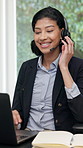 Woman, headset and laptop in home with remote work, administration or discussion for task management. Happy, person and virtual assistant talk in house with computer, internet and contact for job.
