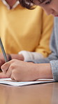 Child, hands and writing with tutor for homework, learning assistance and knowledge growth in home. Boy, taking notes and study with teacher for school task, test preparation and help with education.