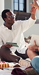 College students, high five and happy man with tablet, outdoor and celebration for academic growth. University campus, education and excited for achievement with friends, laugh and people with tech