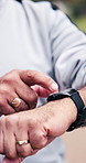 Person, hands and fitness with watch for heart rate, outdoor workout or tracking performance. Closeup, active or runner monitoring steps with wristwatch for calories, exercise or training in park