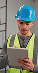 Electrician, man and inspection in construction site with tablet, typing maintenance report and plan. Technician, person and quality assurance in building with tech, electrical repair and renovation.