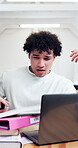 College student, stress and man with laptop, chaos and frustrated by academic pressure in classroom. Education, books and person with depression, timelapse and tired with assignment in university