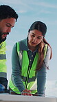 People, team and outdoor with blueprint for meeting, renovation idea and planning with instruction. Man, woman and floorplan on worksite for discussion, engineer collaboration and problem solving
