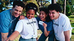 Volunteer, team and park with selfie for outdoor charity, community service or outreach together. Happy people, group or NGO with smile, capture moment or photography for picture or memory in nature