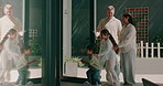 Open door, parents and running with kids in new home for property investment, mortgage or relocation. Mom, dad and children at entrance for moving in with interracial family, real estate and happy