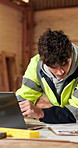 Blueprint, construction and man with laptop in carpentry workshop for lumber or timber supply. Warehouse, floor plan and project management with carpenter in woodworking factory for custom order